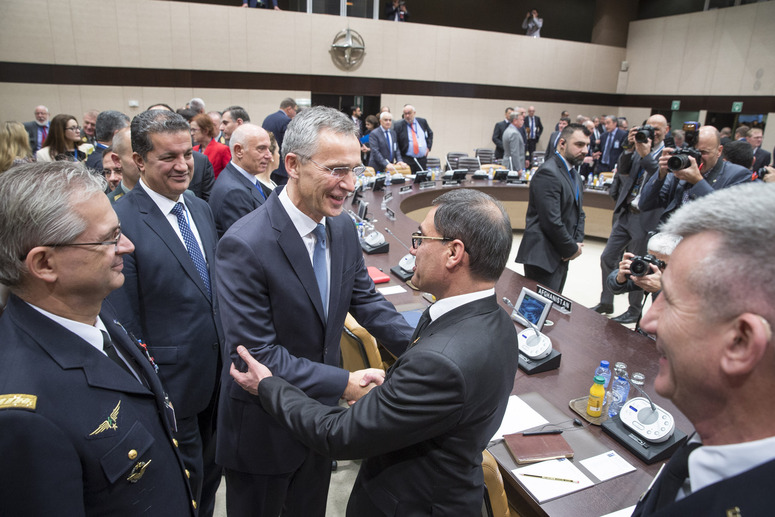 Centre: NATO Secretary General Jens Stoltenberg greeting Tariq Shah Bahrami (Acting Minister of Defence, Afghanistan)