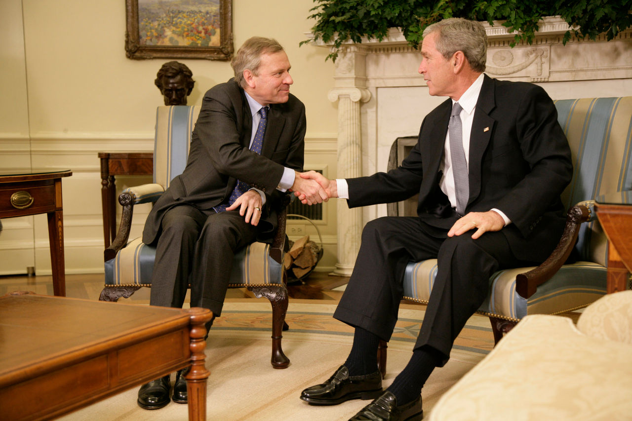President George W. Bush welcomes NATO Secretary-General Jaap de Hoop Scheffer to the Oval Office Friday, Oct. 27, 2006. White House photo by Kimberlee Hewitt 