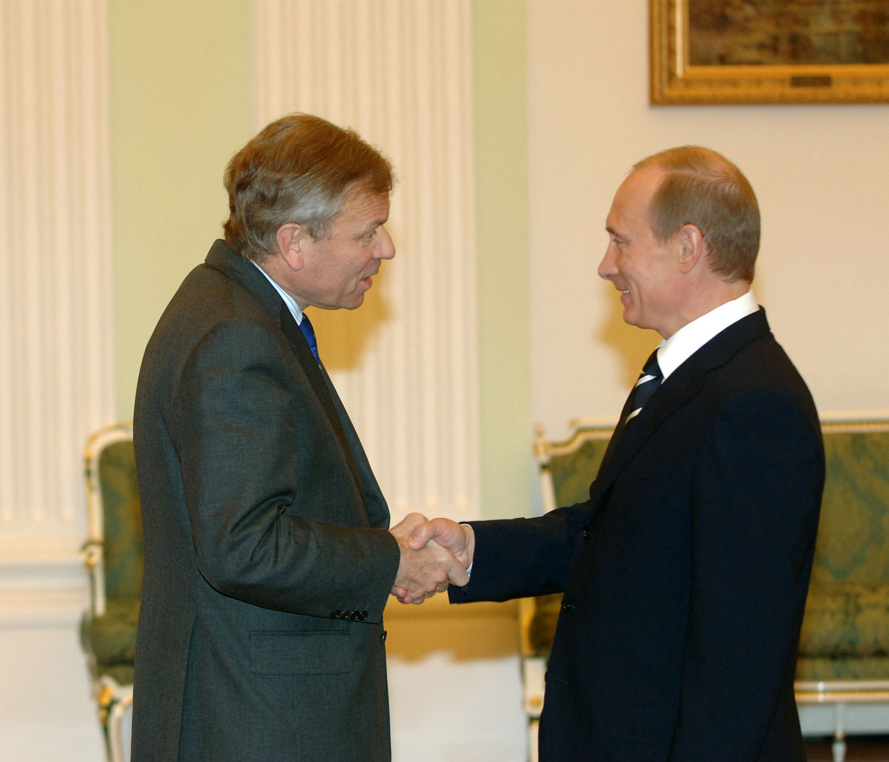 Left to right: NATO Secretary General, Jaap de Hoop Scheffer shaking hands with President Vladimir Putin of the Russian Federation