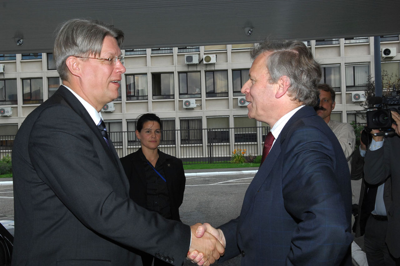 Left to right: President Valdis Zatlers of Latvia being greeted by NATO Secretary General Jaap de Hoop Scheffer