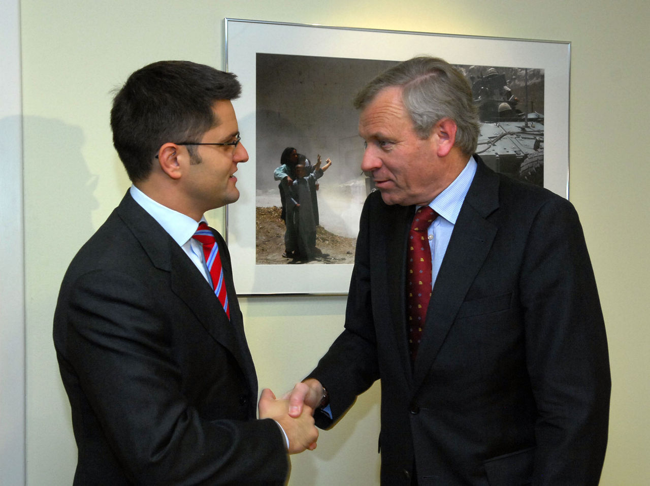 Left to right: Vuk Jeremic (Minister of Foreign Affairs, Serbia) shaking hands with NATO Secretary General, Jaap de Hoop Scheffer