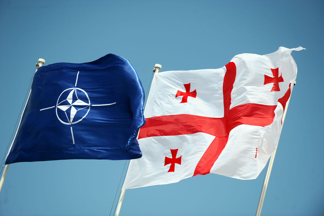 The flags of NATO and Georgia