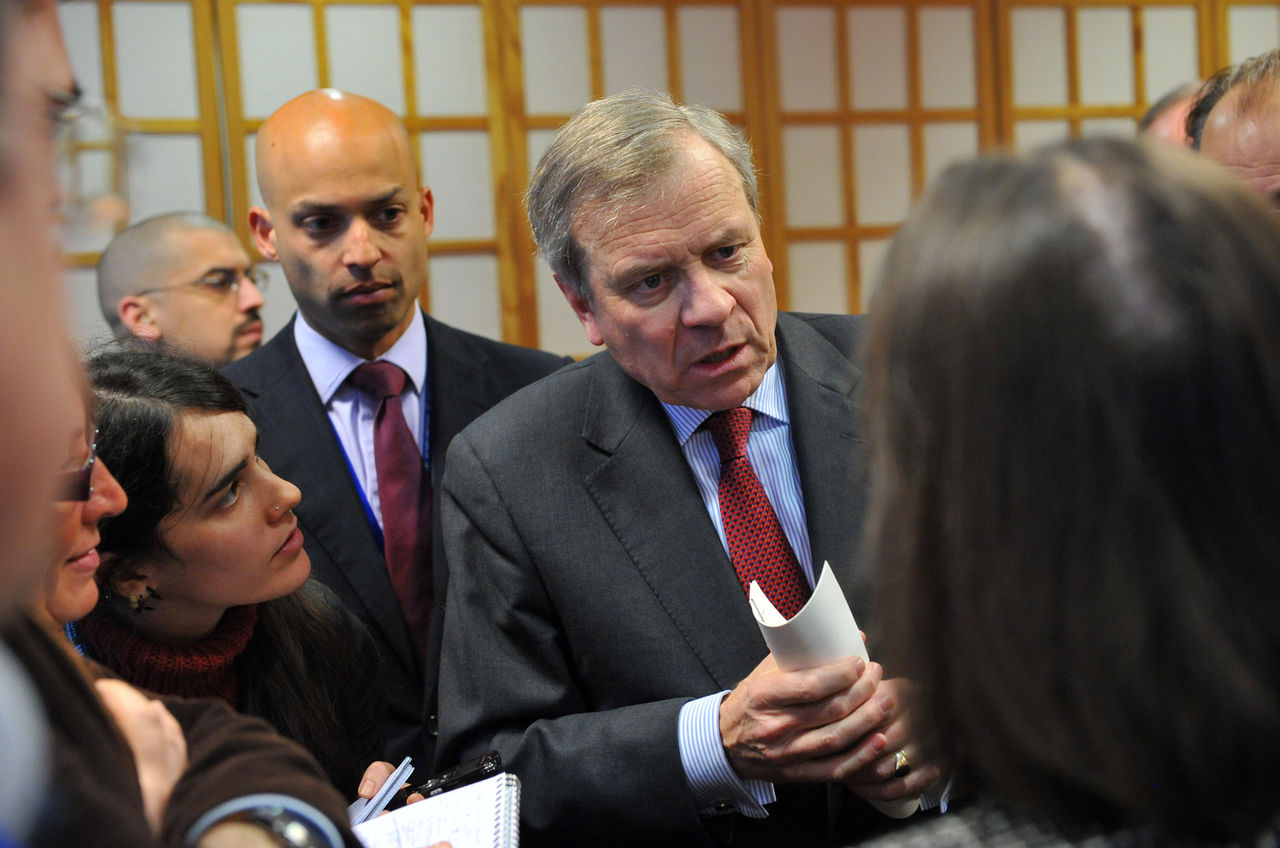 Centre:  NATO Secretary General, Jaap de Hoop Scheffer being approached by members of the press.