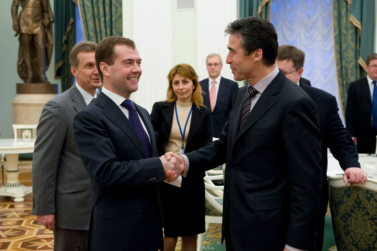 President Dmitry Medvedev of Russia shakes hands with NATO Secretary General Anders Fogh Rasmussen.