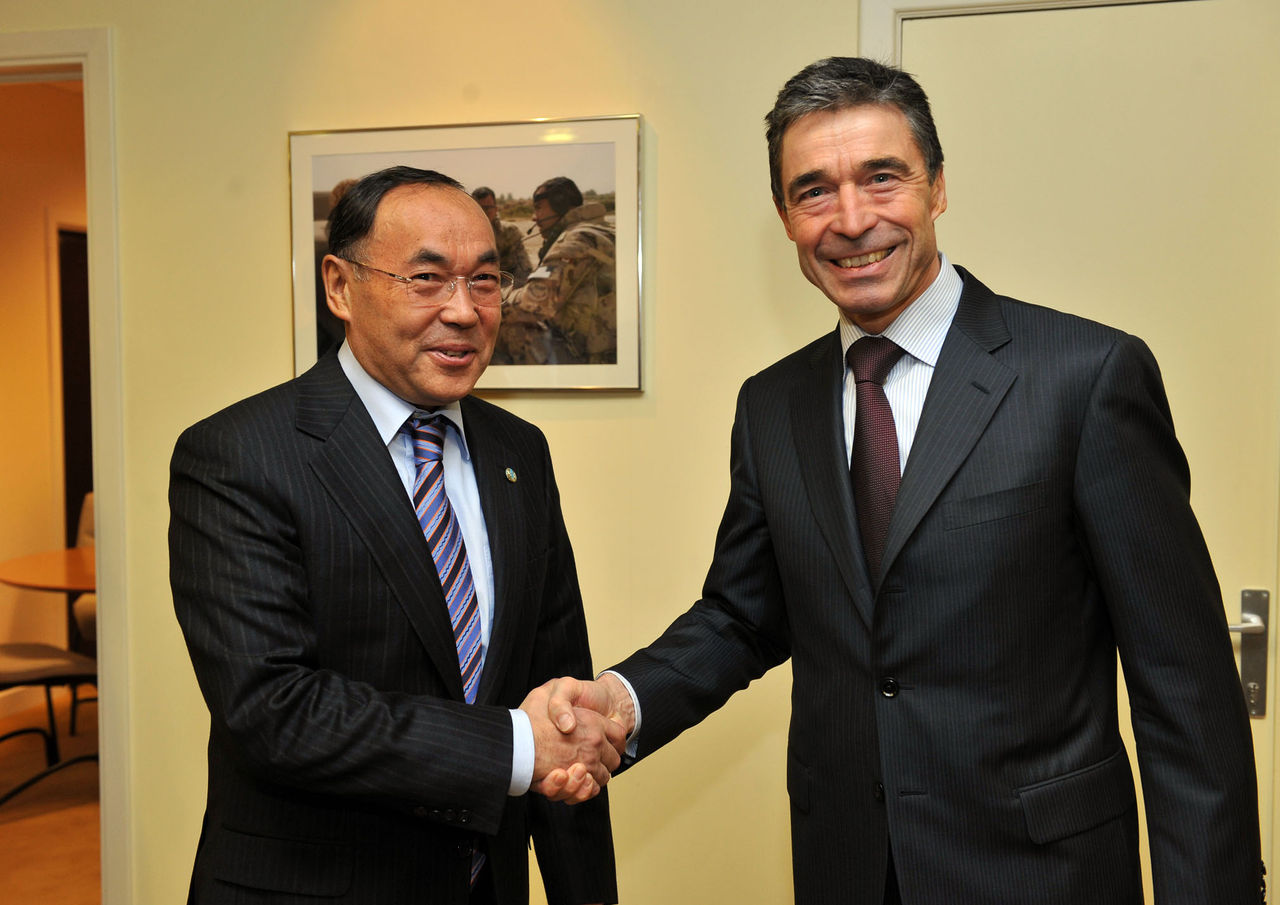 Left to right:  Kanat Saudabayev (Minister of Foreign Affairs of Kazakhstan) shaking hands with NATO Secretary General, Anders Fogh Rasmussen.