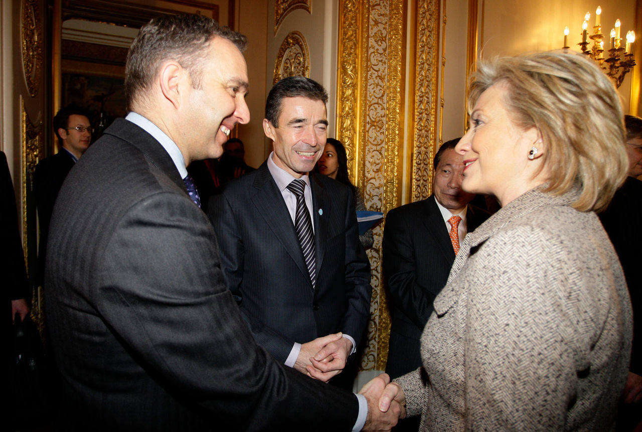 Mark Sedwill (L) UK newly appointed NATO Senior Civilian Representative and Anders Fogh Rasmussen, Secretary General of NATO, North Atlantic Treaty Organization (C) meet Hillary Clinton, United States of America Secretary of State (R) at Lancaster House during Afghanistan, The London Conference in London, UK today January 28, 2010.  The one-day London conference on Afghanistan, organized by the United Kingdom, France and Germany, is highlighting European civilian and foreign aid contributions to Afghanistan. Picture: Anita Maric / newsteam.co.uk  Crown Copyright - For editorial purposes only - For any further enquiries please contact News Team International. 