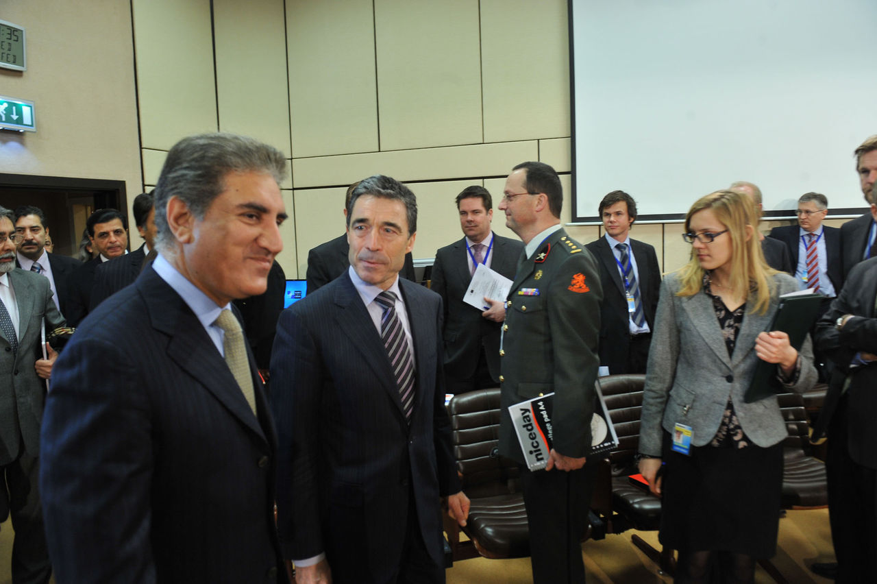 NATO Secretary General Anders Fogh Rasmussen and the Minister of Foreign Affairs of Pakistan, Mr. Shah Mahmood Qureshi on their way to the North Atlantic Council.