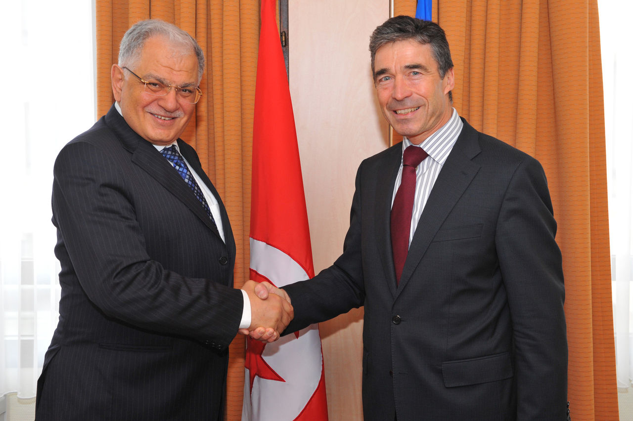 The Minister of Foreign Affairs of the Republic of Tunisia, Kamel Morjane shaking hands with NATO Secretary General Anders Fogh Rasmussen.
