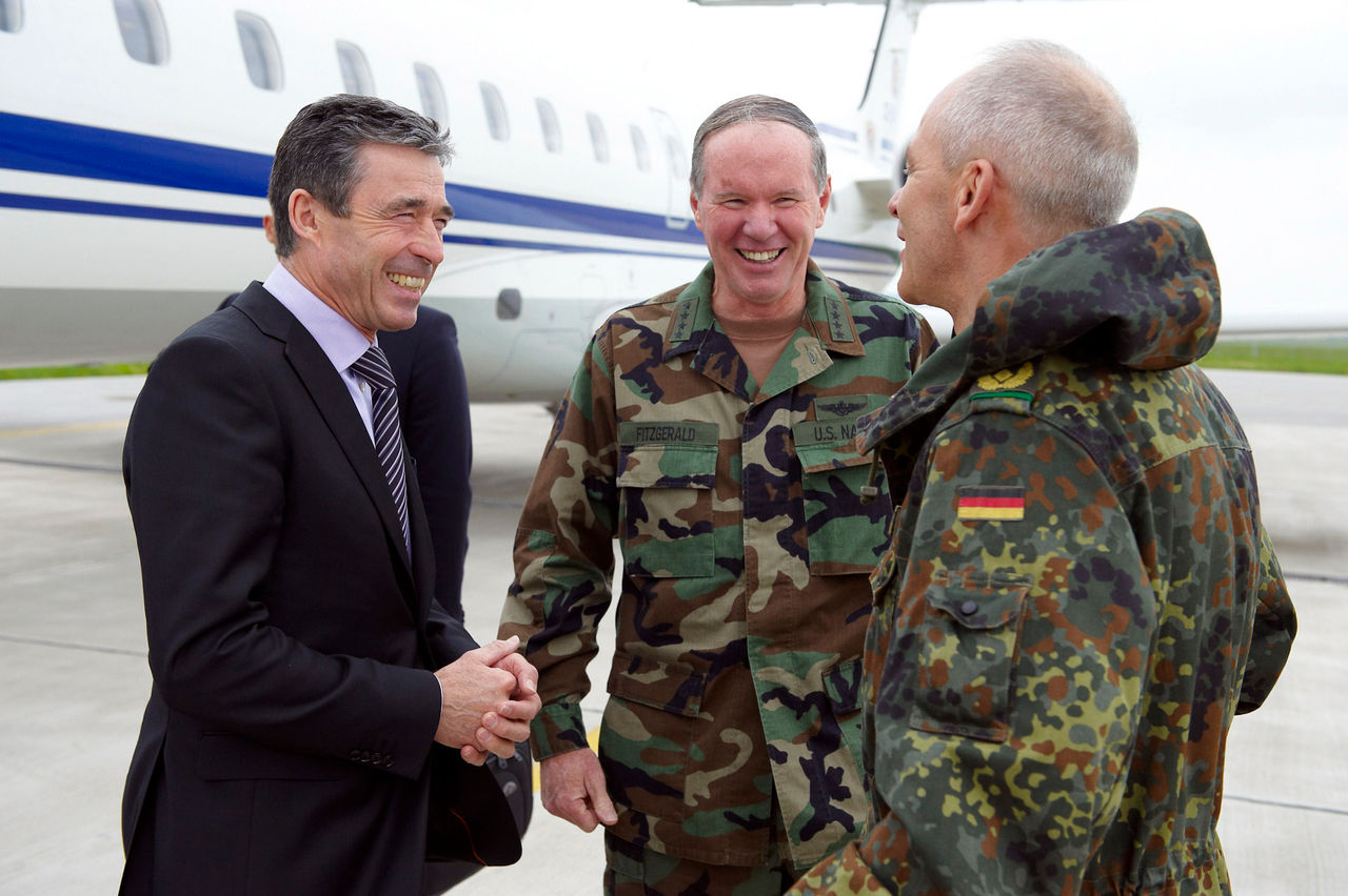 Arrival at Pristina Airport - Left to right:  NATO Secretary General, Anders Fogh Rasmussen talking with Admiral Mark Fitzgerald (Commander US Naval Forces Europe) and Lt. General Markus J. Bentler (Commander KFOR)