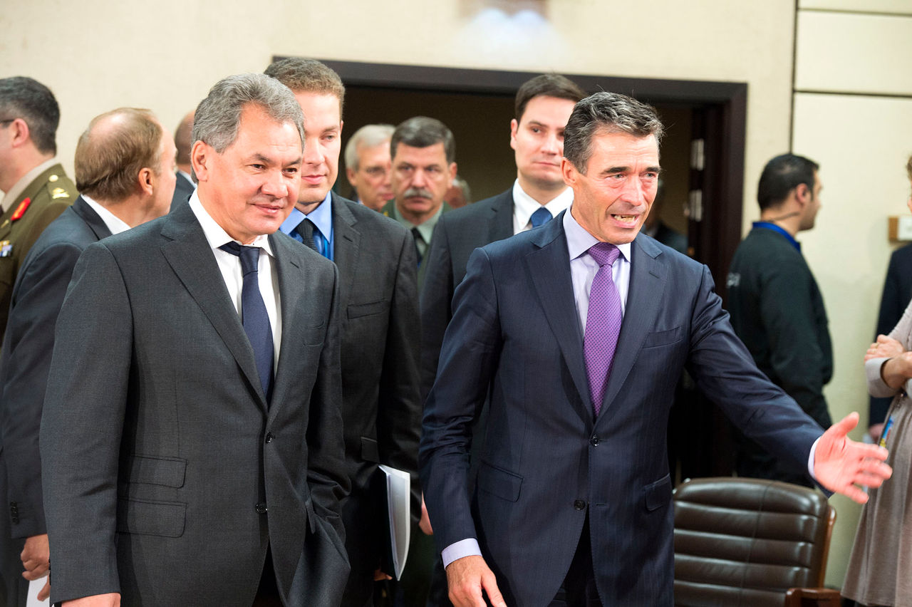 Left to right: Sergey Shoygu (Minister of Defence, Russian Federation) walking into the meeting room with NATO Secretary General Anders Fogh Rasmussen