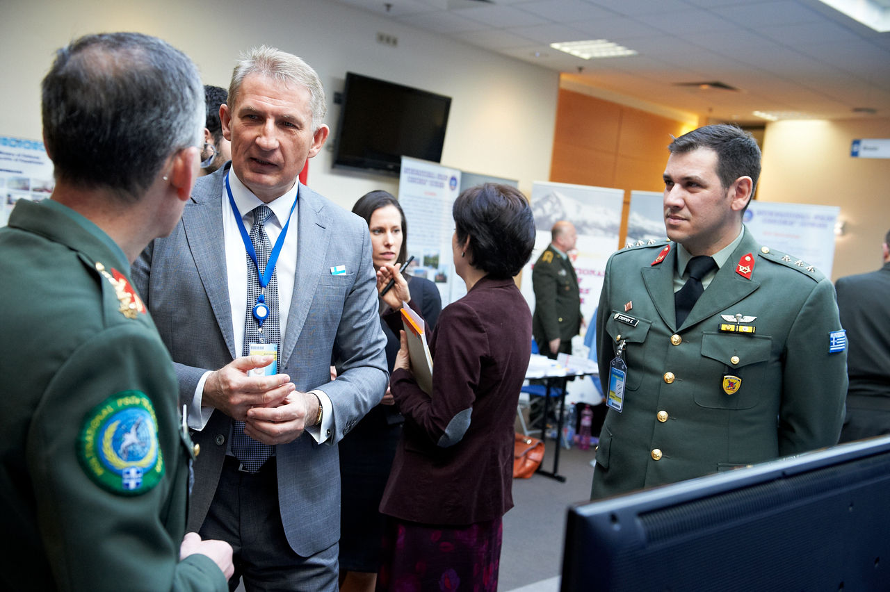 Dr Jaroslaw Skonieczka, Senior Director for Integration, Partnerships and Cooperation, NATO International Staff disusses education and training activities with representatives from the Hellenic Multinational Peace Support Operations Training Centre (MPSOTC).