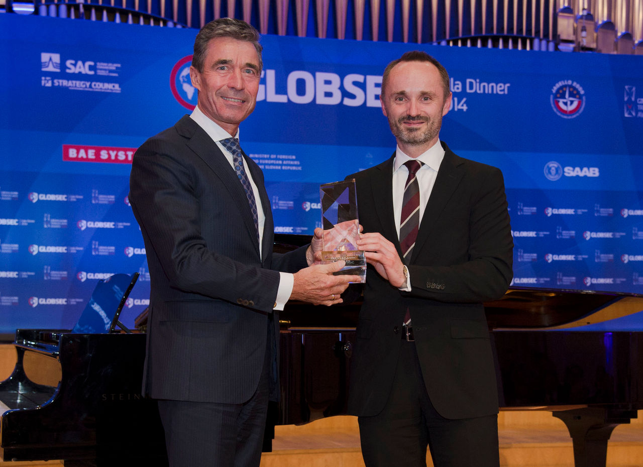 NATO Secretary General Anders Fogh Rasmussen receives the 2014 Czech and Slovak Transatlantic Award from the hands of Ambassador Tomas Valasek, Permanent Representative of Slovakia on the North Atlantic Council, at a ceremony held in the framework of the 2014 GLOBSEC Conference, Bratislava 