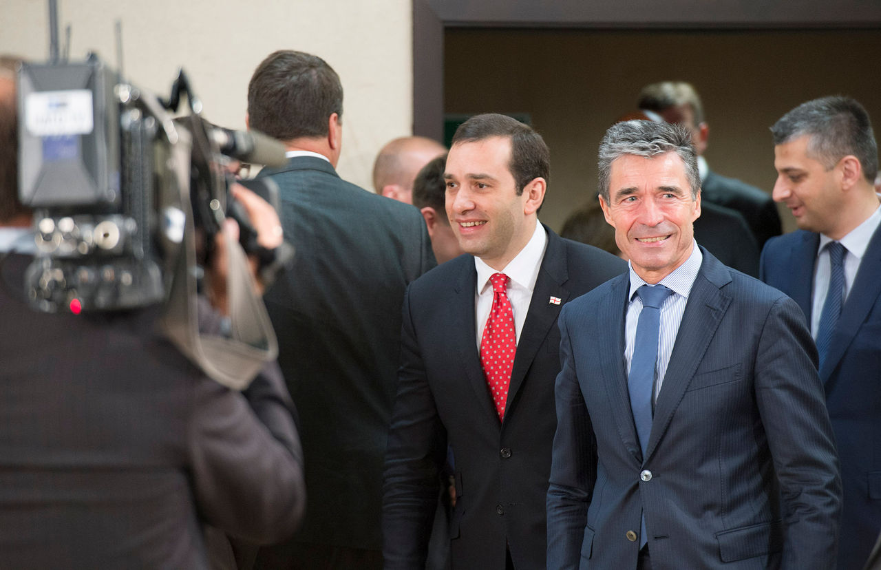 Left to right:  Irakli Alasania (Minister of Defence, Georgia) walking into the meeting room with NATO Secretary General Anders Fogh Rasmussen