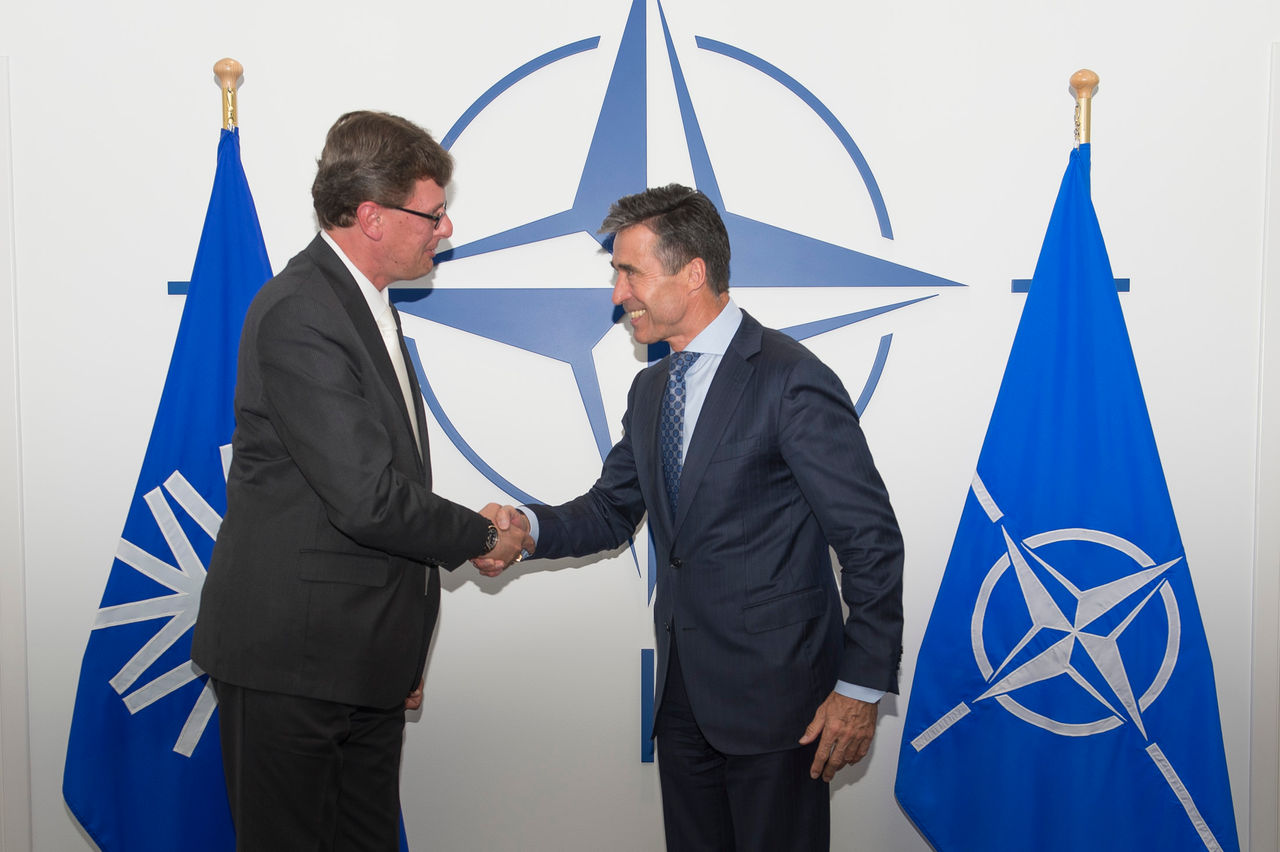 NATO Secretary General Anders Fogh Rasmussen and the Chairman of the International Board of Auditors for NATO (IBAN) Dr. Charilaos Charisis.