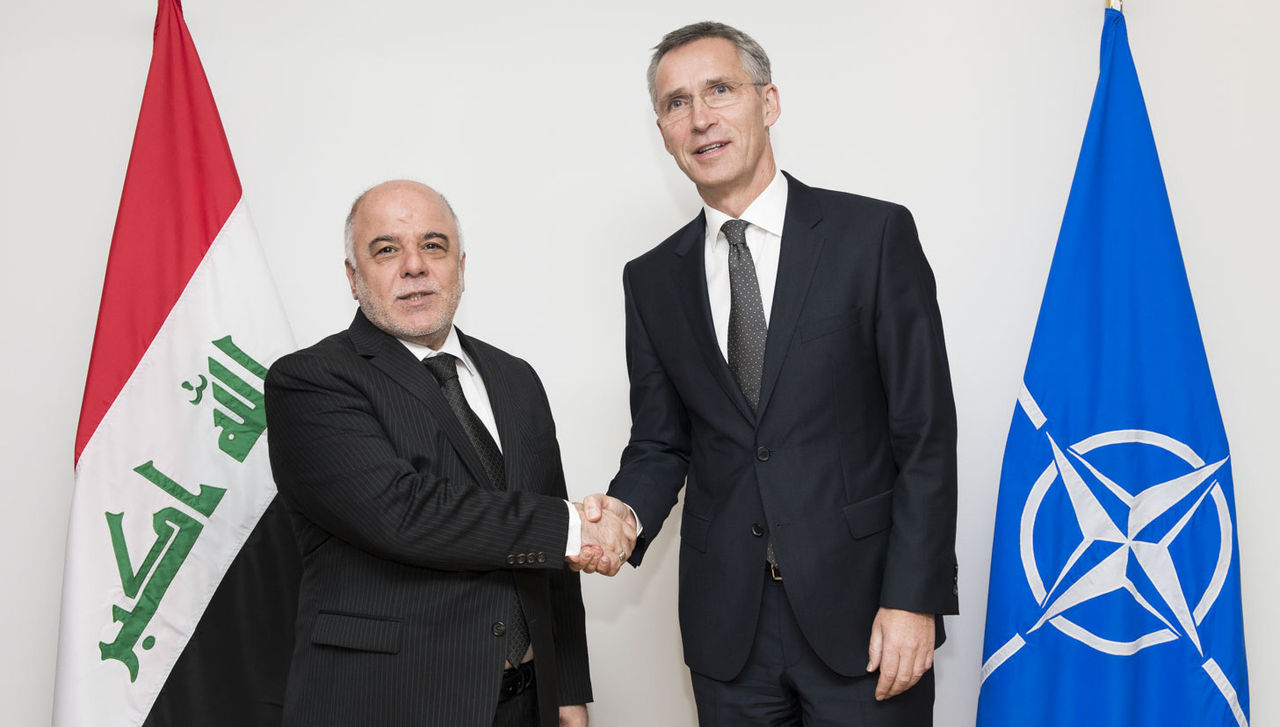 Left to right: Haidar al-Abadi (Prime Minister of Iraq) shaking hands with NATO Secretary General Jens Stoltenberg 