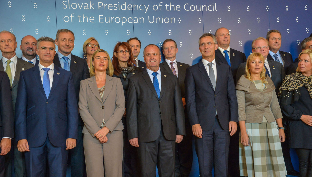 Family portrait of EU Minister of Defence with NATO Secretary General Jens Stoltenberg