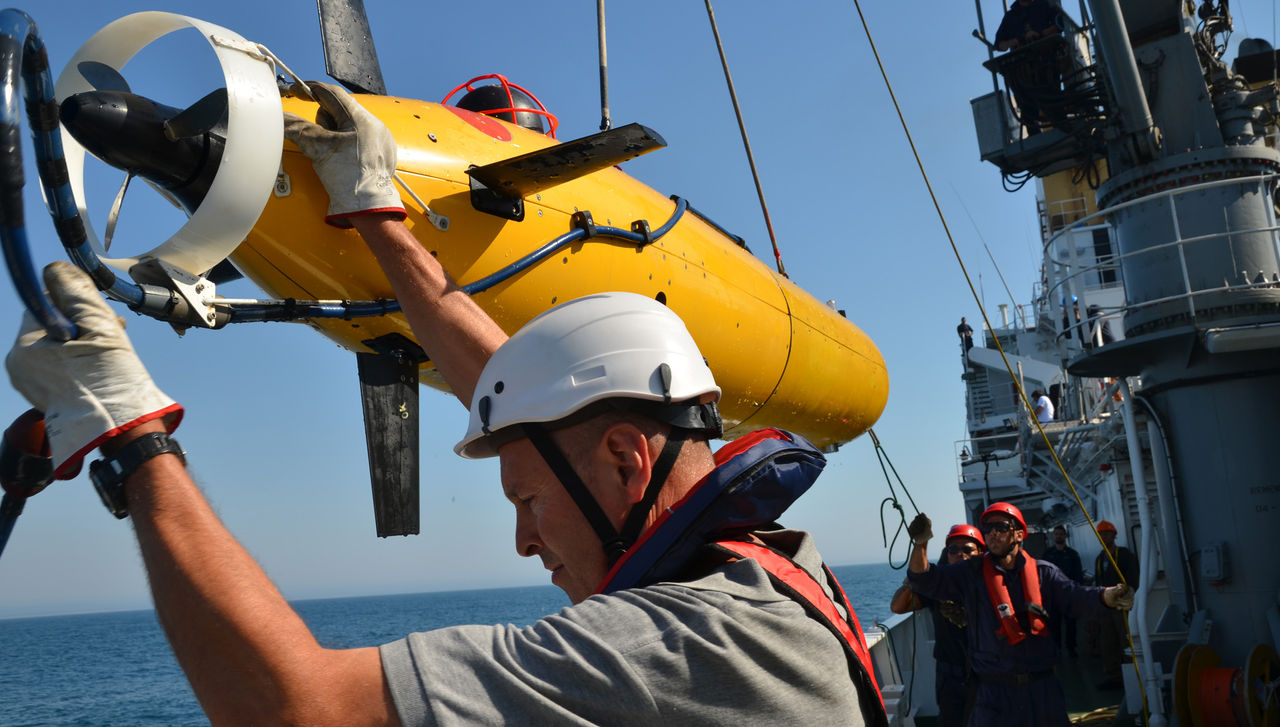 The NATO STO Centre for Maritime Research and Experimentation (CMRE) based in La Spezia (Italy) is working to enhance Allied robotic capabilities at sea and under the sea. Experimentation includes tests with autonomous underwater vehicles (AUVs), such as the one in the picture, and the development of new solutions to empower networks of robots and enable full interoperability among underwater assets. In the picture: an Ocean Explorer AUV being recovered from the NATO Research Vessel Alliance during a sea trial.