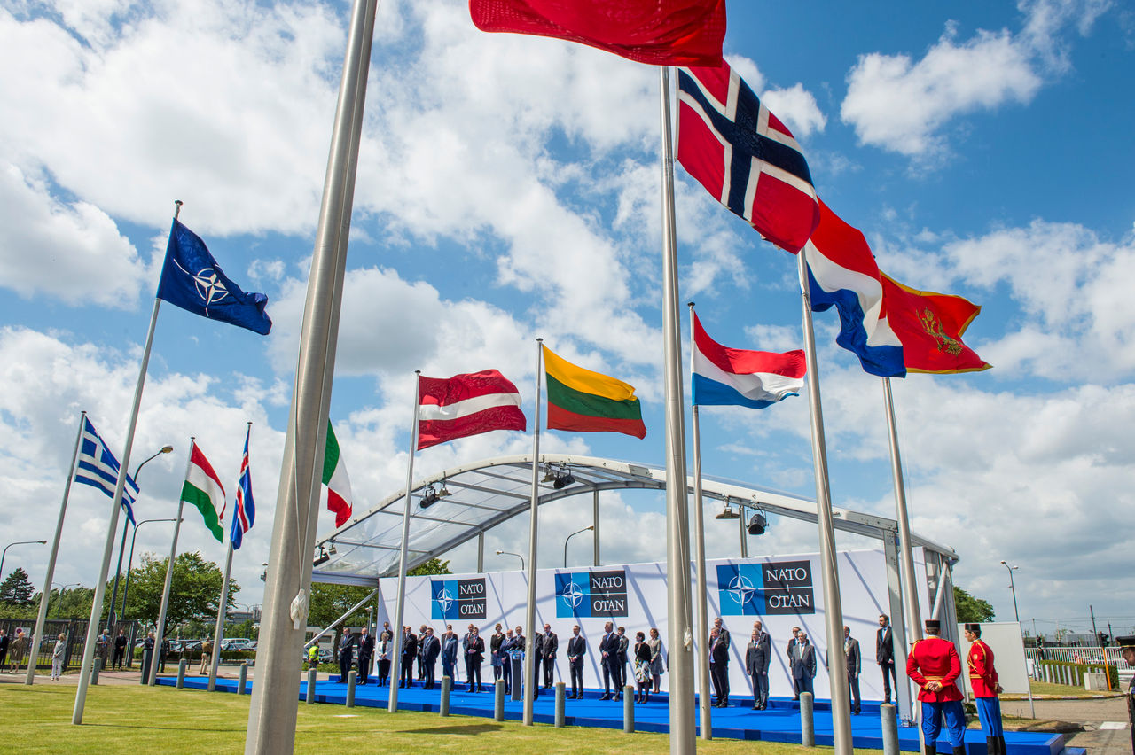 NATO permanent representatives at the flag-raising ceremony marking the accession of Montenegro to NATO