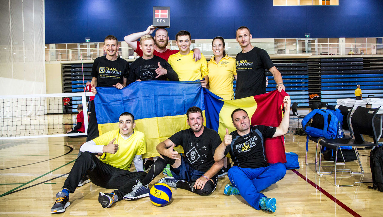Team Ukraine train for the sitting volleyball competition at the Invictus Games in Toronto. 550 competitors from 17 nations are competing in the games. They'll compete in 12 sports including wheelchair rugby, swimming and golf. NATO has provided support for the Ukrainian and Afghan teams. 