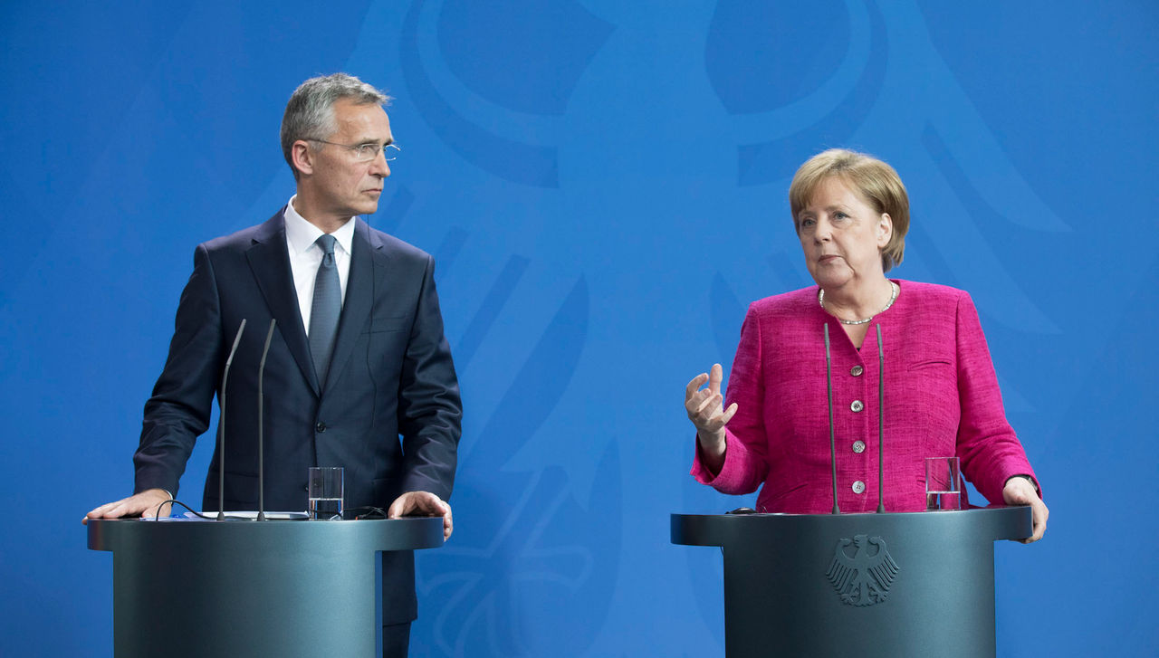 Joint press point with NATO Secretary General Jens Stoltenberg and German Chancellor Angela Merkel