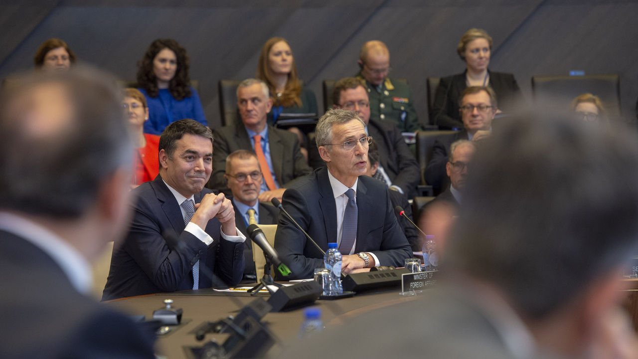 NATO Secretary General Jens Stoltenberg and the Foreign Minister of the invitee country, Nikola Dimitrov