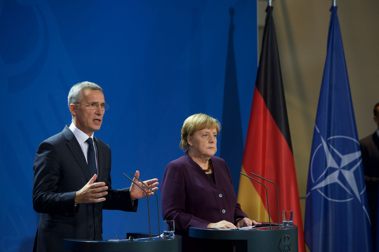 Joint press point with NATO Secretary General Jens Stoltenberg and German Chancellor Angela Merkel