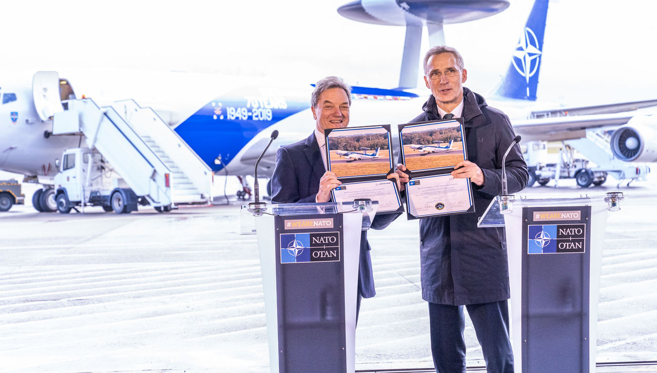 NATO Secretary General Jens Stoltenberg and the President of Boeing International, Sir Michael Arthur