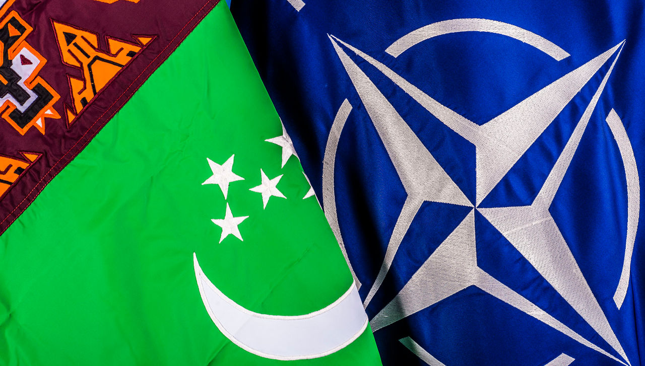 NATO and turkmenistan flags