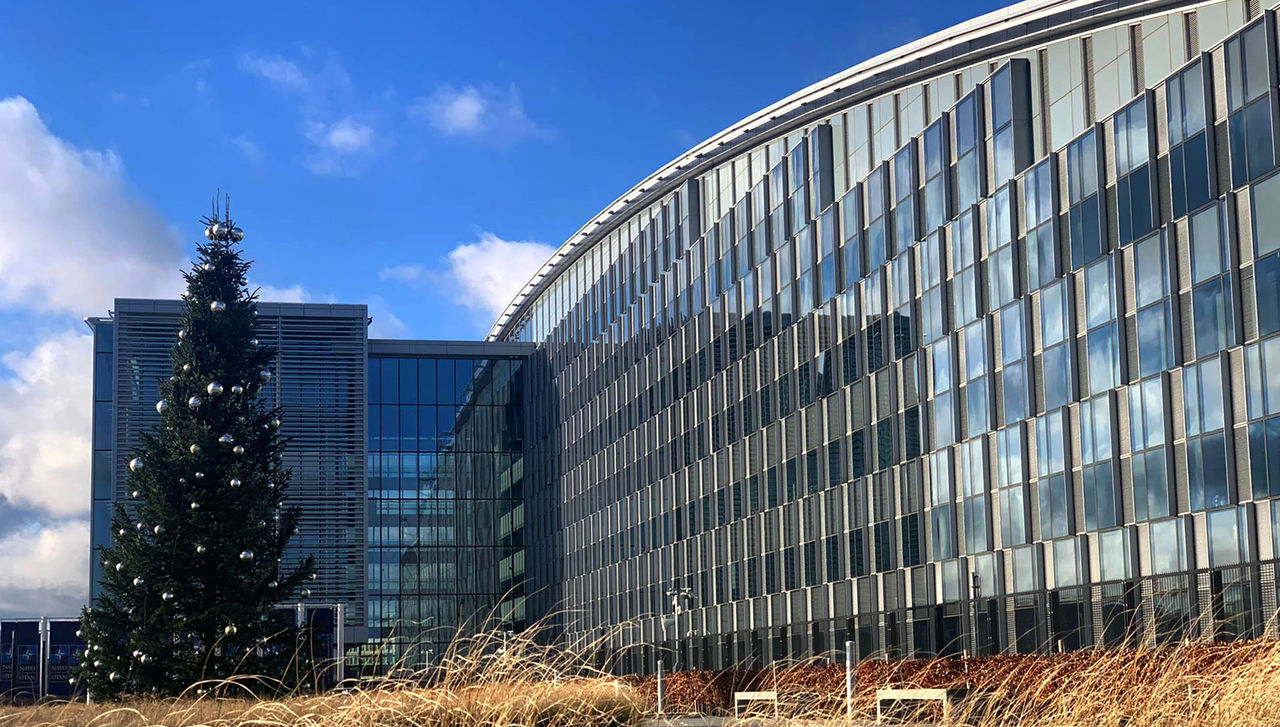 Christmas tree outside the Headquarters, near the NATO Star and the Allied flags