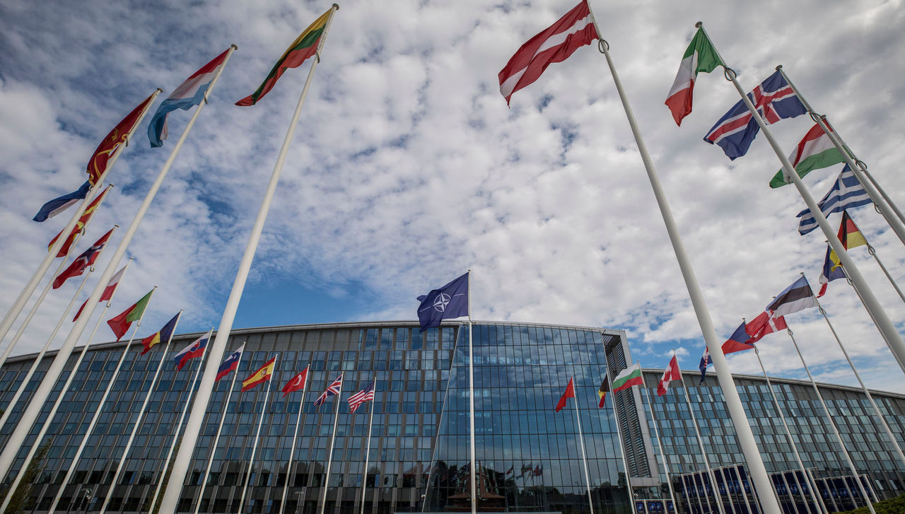 Shots of NATO Flags and sculpture
