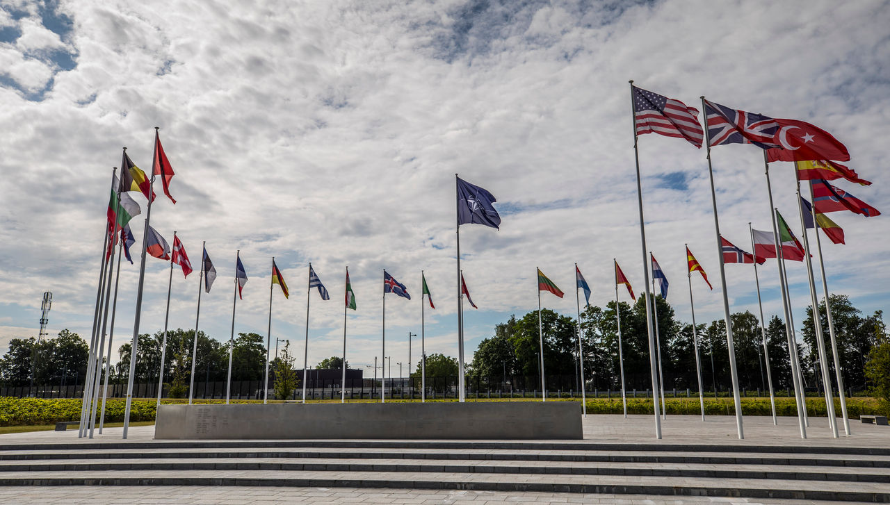 Shots of NATO Flags and sculpture