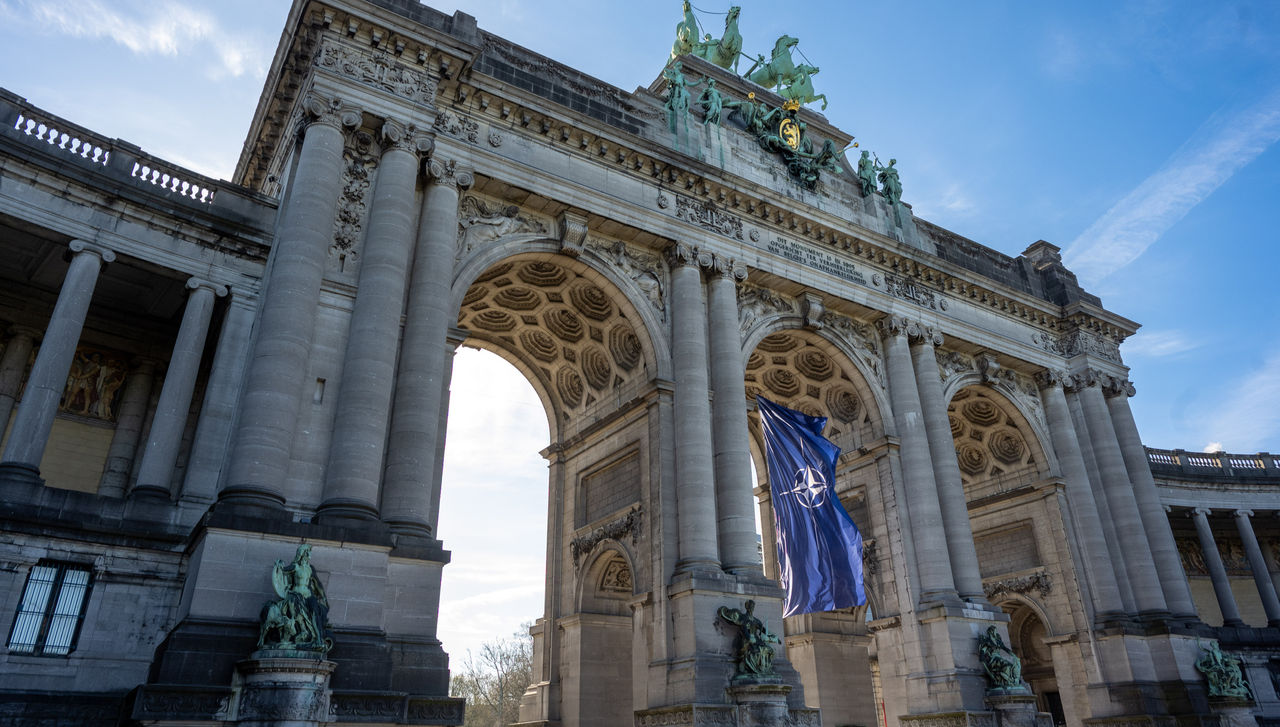 NATO Flag at the Arches of the Cinquantenaire in Brussels for the occasion of NATO Day