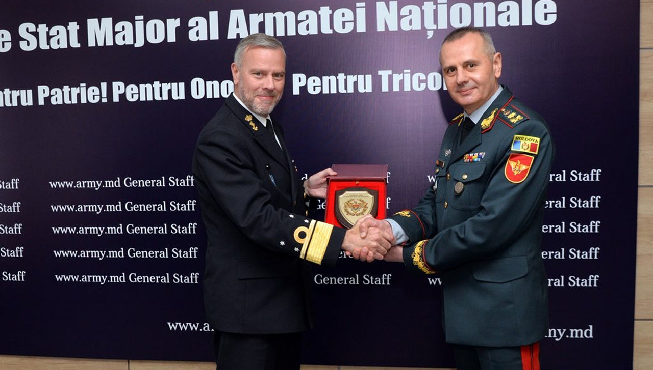 Admiral Rob Bauer, Chair of the NATO Military Committee and Brigadier General Eduard Ohladciuc, Chief of National Army General Staff, Commander of the National Army of the Republic of Moldova, shake hands at the Joint Press Conference held at the Ministry of Defence