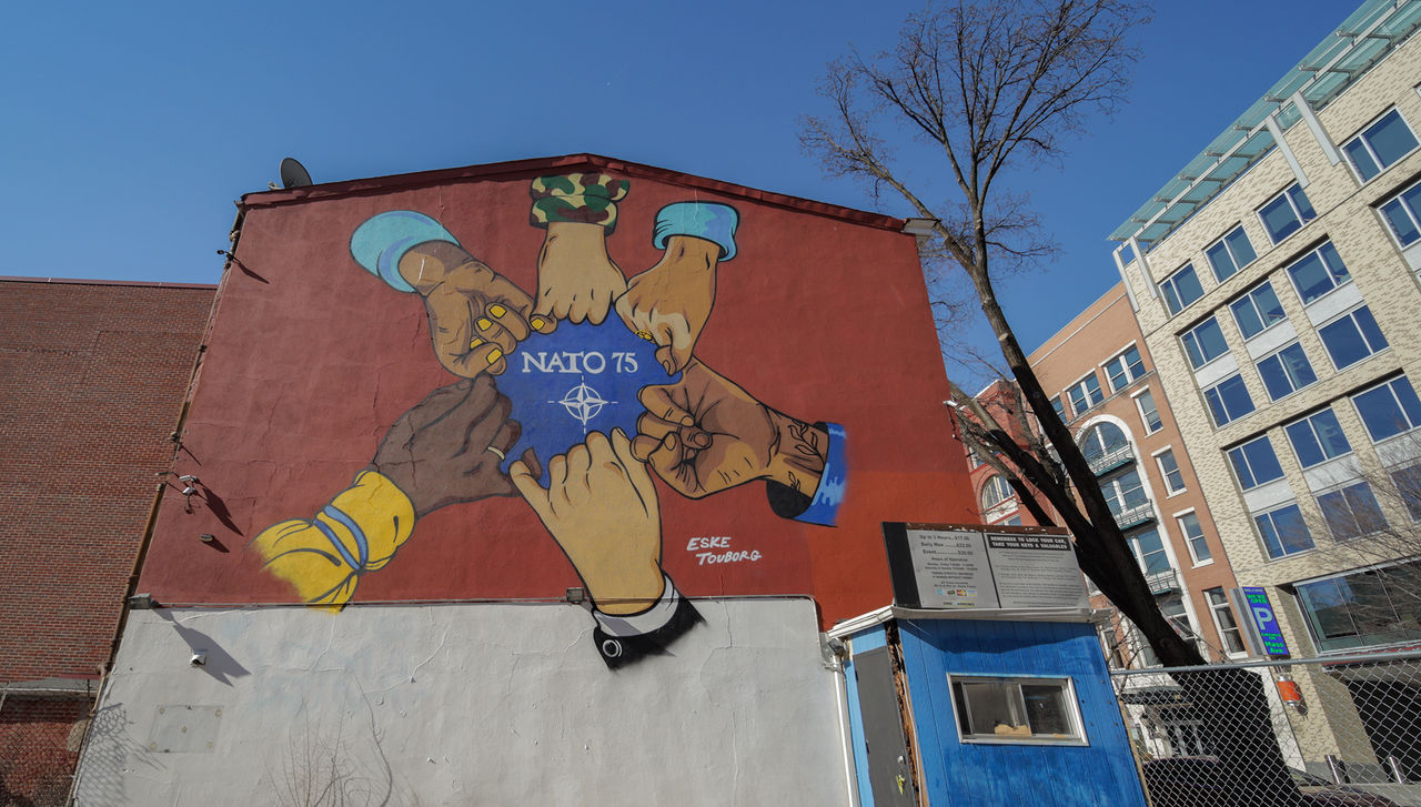 NATO 75th anniversary summit mural in Washington, D.C. by Danish artist Eske Tourbourg and American mural artist Hamilton Glass