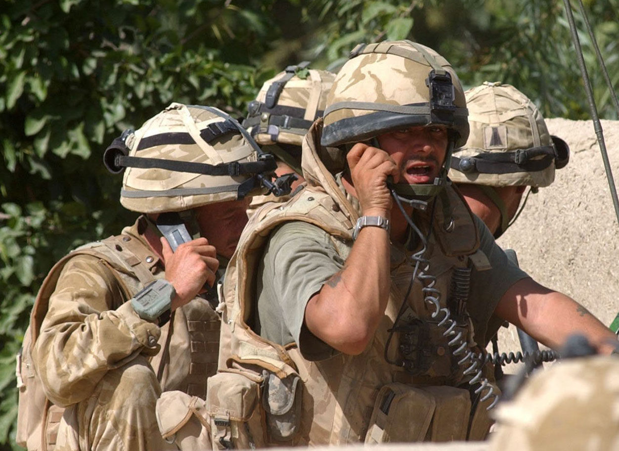 HQUKTF-2007-066-0242
‘In the line of fire’ exchanging gun fire as a commander keeps everyone informed on the radio.

B Company 1 Royal Welsh playing there part in clearing the Taliban from key area of ground in the Green Zone in Central Helmand, compound clearances and coming under fire from the Taliban. 

Date: 30th July 2007

Location: Central Helmand Provinces, Afghanistan  

Unit: 1st Batallion Royal Welsh

Photographer: Sergeant Will Craig

Event: Operation Chakush

Crown Copyright 

Media Ops 
Lashkar Gah 
Helmand 
Afghanistan 
British Forces Post Office 715
TEL: 0799529916
