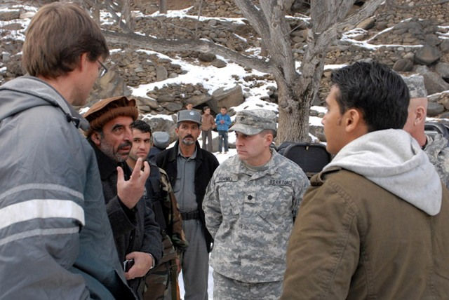 PANJSHIR PROVINCE, Afghanistan – Lt. Col. Eric Hommel, commander for Panjshir Provincial Reconstruction Team, and Jeremy Lewis, United States Agency for International Development, Panjshir PRT, listens to Amin Daqiq, the Panjshir Provincial executive director in Panjshir province, Afghanistan, Dec. 22, about energy production requirements in the valley. The mission for the PRT is to build an enduring partnership with the people of Panjshir by assisting them with security, development, economic growth and good governance. The PRT seeks to leverage Panjshir’s permissive security environment to build local institutional capacity, Afghan ownership, and stronger links to the central government, so that the Islamic Republic of Afghanistan can provide all essential services to the people of Panjshir. (Photo by U.S. Army Lt. Col. Mike Brady, Task Force Cyclone Public Affairs)
