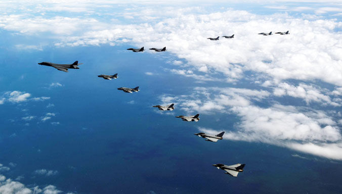 BALTOPS 2018: US AirForce B-1B Lancer, 2x F-15E Strike Eagles, 2x F-16C Fighting Falcons; 2x US Navy F/A-18 Hornets; 2x Polish Air Force Su-22 Fitters, 2x F-16 Fighting Falcons; and 2x Spanish Air Force Eurofighter Typhoons fly in a formation flight over the Baltic Sea.