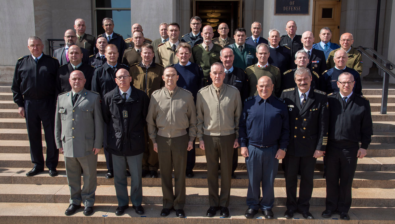 Marine Corps Gen. Joe Dunford, chairman of the Joint Chiefs of Staff, speaks to Military Representatives from the North Atlantic Treaty Organization on the River Entrance steps at the Pentagon, March 13, 2019. (DoD Photo by Navy Petty Officer 1st Class Dominique A. Pineiro)