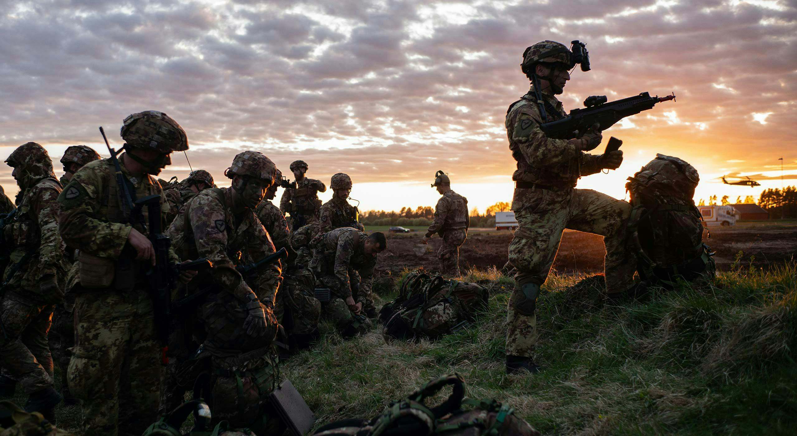 Italian Army paratroopers prepare to move out during exercise Swift Response 24. Sweden, May 2024