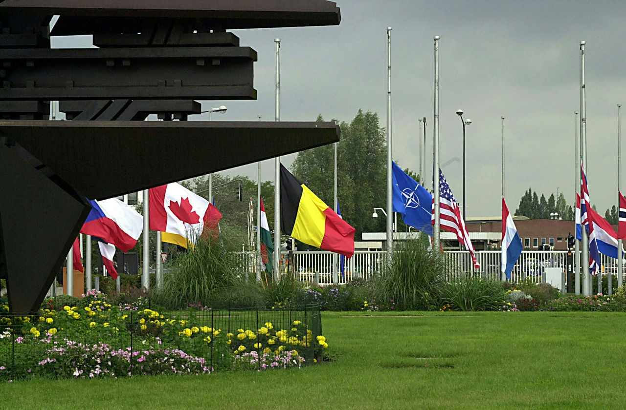 12 September 2001
Flags of the 19 member countries flying at half mast at the main entrance to NATO Headquarters in Brussels following the terrorist attack on the United States of 11 September