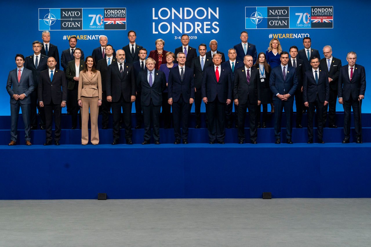 Front row left to right:
Justin Trudeau (Prime Minister of Canada)
Rumen Radev (President of Bulgaria)
Sophie Wilmes (Prime Minister of Belgium)
Edi Rama (Prime Minister of Albania)
Boris Johnson (UK Prime Minister)
Jens Stoltenberg (NATO Secretary General)
Donald Trump (US President)
Recep Tayyip Erdogan (President of Turkey)
Pedro Sanchez Perez-Castejon (Prime Minister of Spain)
Marjan Sarec (Prime Minister of Slovenia)
Milos Zeman (President of Czech Republic)

Second row left to right:
Andrej Plenovic (Prime Minister of Croatia)
Mette Frederiksen (Prime Minister of Denmark)
Juri Ratas (Prime Minister of Estonia)
Emmanuel Macron (President of France)
Angela Merkel (German Chancellor)
Kyriakos Mitsotakis (Prime Minister of Greece)
Victor Orban (Prime Minister of Hungary)
Katrin Jakobsdottir (Prime Minister of Iceland)
Giuseppe Conte (Prime Minister of Italy)
Eglis Levits (President of Latvia)

Third row left to right:
Saulius Skvernelis (Prime Minister of Lithuania)
Xavier Bettel (Prime Minister of Luxembourg)
Dusko Markovic (Prime Minister of Montenegro)
Mark Rutte (Prime Minister of The Netherlands)
Erna Solberg (Prime Minister of Norway)
Andrzej Duda (President of Poland)
Antonio Costa (Prime Minister of Portugal)
Klaus Werner Iohannis (President of Romania)
Zuzana Caputova (President of Slovak Republic)
Zoran Zaev (Prime Minister of North Macedonia)

















 
