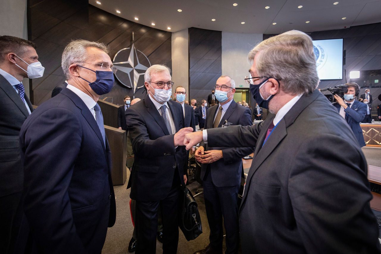 Left to right: NATO Secretary General Jens Stoltenberg with  Alexander Grushko (Deputy Minister of Foreign Affairs, Russian Federation) and Spiros Lambridis (Permanent Representative to NATO, Greece)