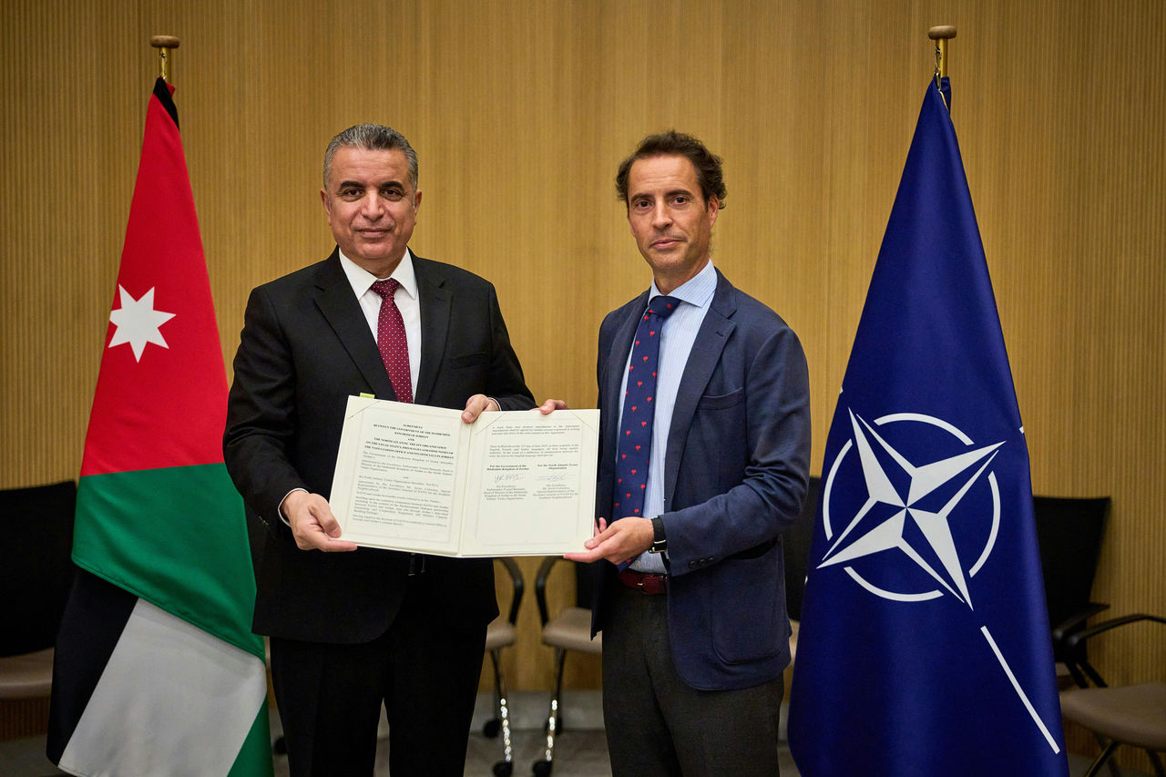 Ambassador Yousef Bataineh, Head of the Mission of Jordan to NATO and Javier Colomina, Special Representative of NATO for the Southern Neighbourhood sign a legal agreement for the opening of the NATO Liaison Office (NLO) in Amman