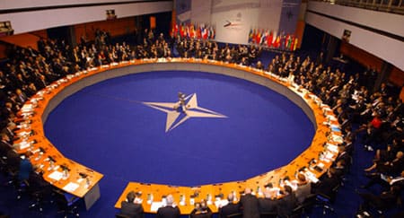 Euro-Atlantic Partnership Council meeting during the NATO summit in Prague, Czech Republic, 22 November 2002 (© NATO)
)