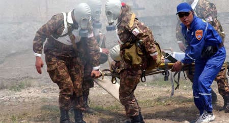 Rehearsing disaster responses: NATO sponsored its first PfP exercise, Ferghana 2003, in Central Asia in April 2003 (© NATO )
)