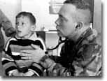 Health check: KFOR is providing essential medical care, including more than 1,000 consultations a day. (Nick Sidle Allied Mouse and Heartstone photo - 28Kb)
)
