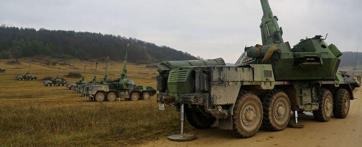  Czech Republic Army soldiers from 1st and 2nd Platoon Field Artillery maneuver a self-propelled gun-howitzer vehicle, called a DANA 152mm, into firing position while conducting simulated fire training during Combined Resolve at the Hohenfels training area at Hohenfels, Germany, Nov. 15, 2013. The exercise trains U.S. Soldiers, and multi-national brigades to defeat complex threats during coalition missions. Since the Joint Multinational Training Command’s Grafenwoehr and Hohenfels training areas are centrally located in Europe, U.S. forces, Army, Air Force, Navy, and Marine develop unique bonds with NATO, allied and multinational forces of 38 European nations. © U.S. Army photo by Spc. Derek Hamilton/Released
