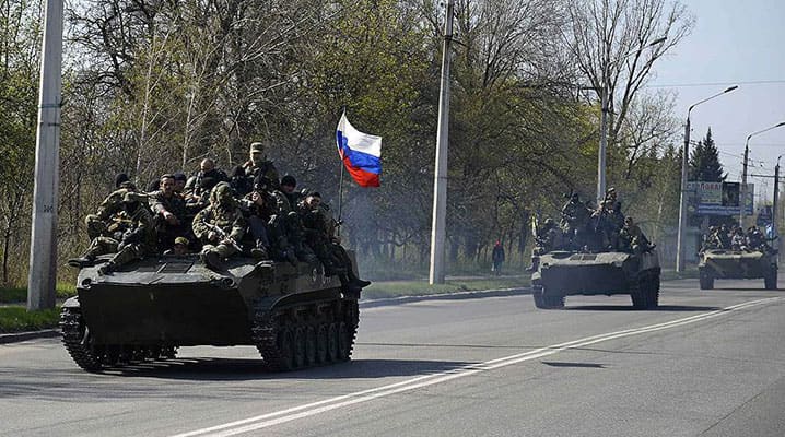  Pictured: Russian forces entering a captured town in Donbas, Ukraine, in April 2014 – Russia’s aggression on Ukraine violates not only Ukraine’s sovereignty and territorial integrity but goes against the very principles on which NATO is based and which Russia itself subscribed to and committed to respect. © Euromaidan Press
