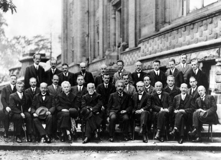 This photograph was taken in Leopold Park in Brussels during the Fifth Solvay Conference on Physics in 1927, and is often referred to as the “most intelligent photograph ever taken”.  Photo credit: Benjamin Couprie, Institut International de Physique de Solvay.
)