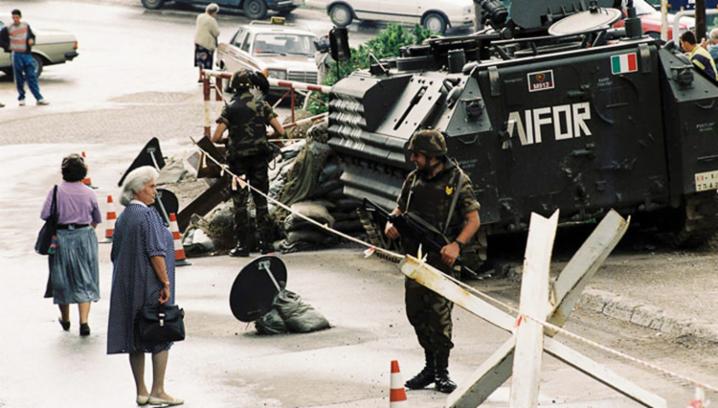  During the 1990s, against the backdrop of the NATO-led peace support operations in the Western Balkans, NATO crisis management exercises started to focus on scenarios involving crisis response operations outside its borders. Pictured: Implementation Force (IFOR) in Bosnia and Herzegovina in December 1995. © NATO
